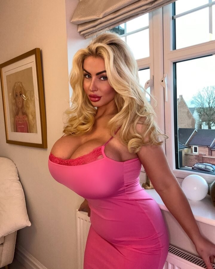 hot blonde house wife with huge fake tits wearing tight pinky skirt