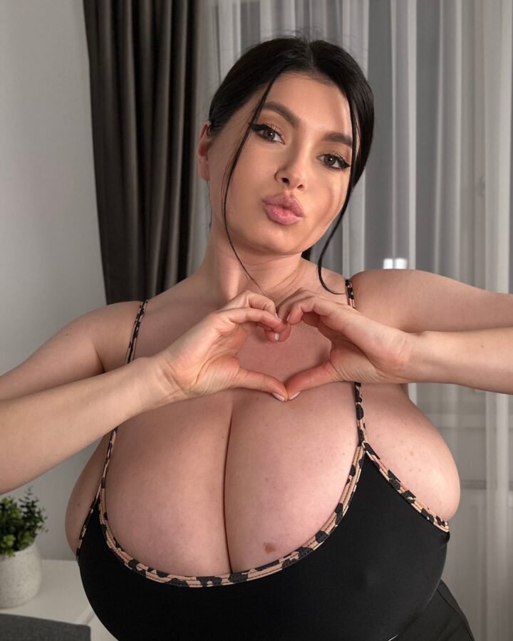 busty webcam model brunette with massive natural tits